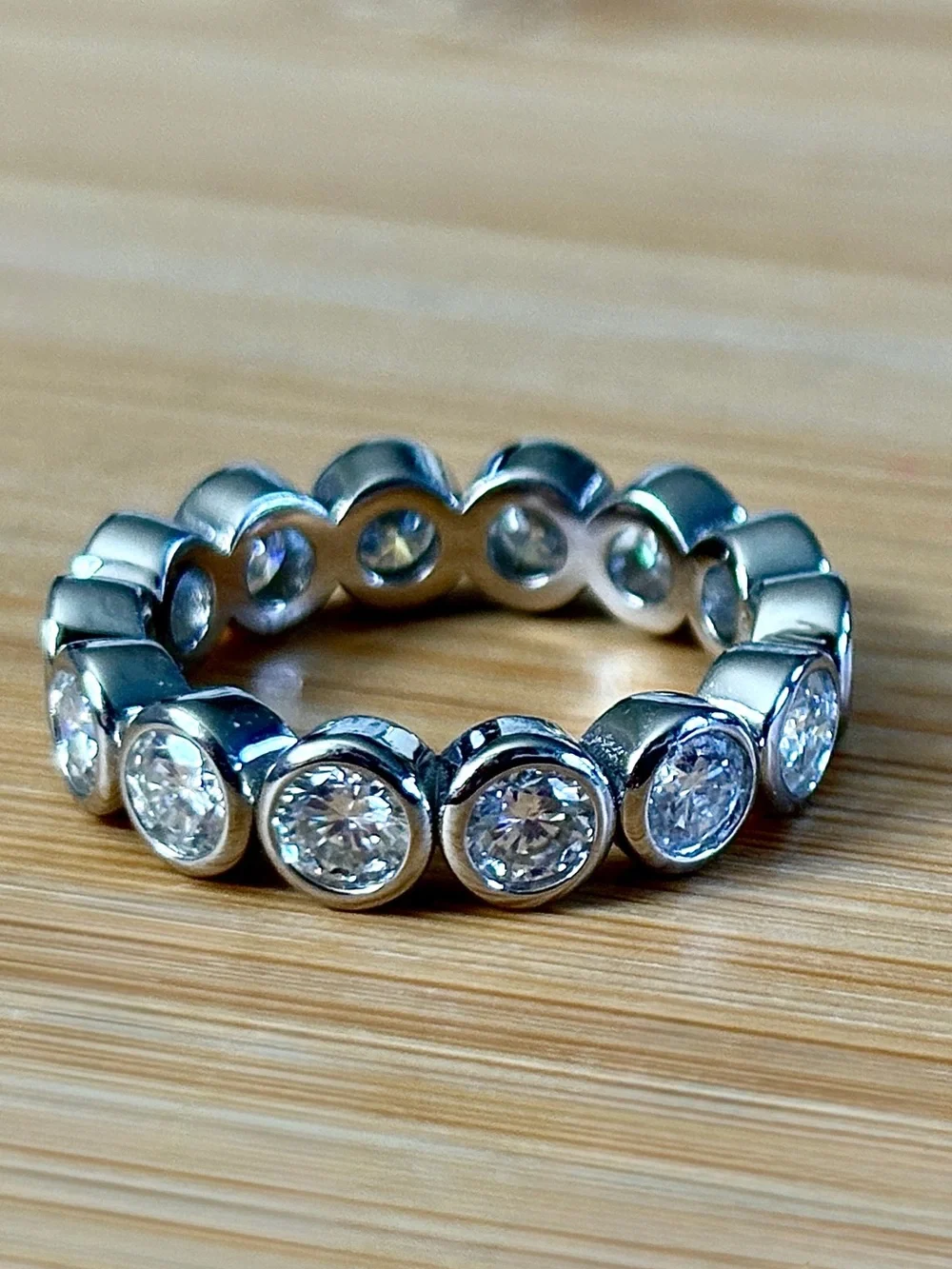 Moissanite eternity ring with .50ct stones in 935 Argentium silver! So sparkly!
